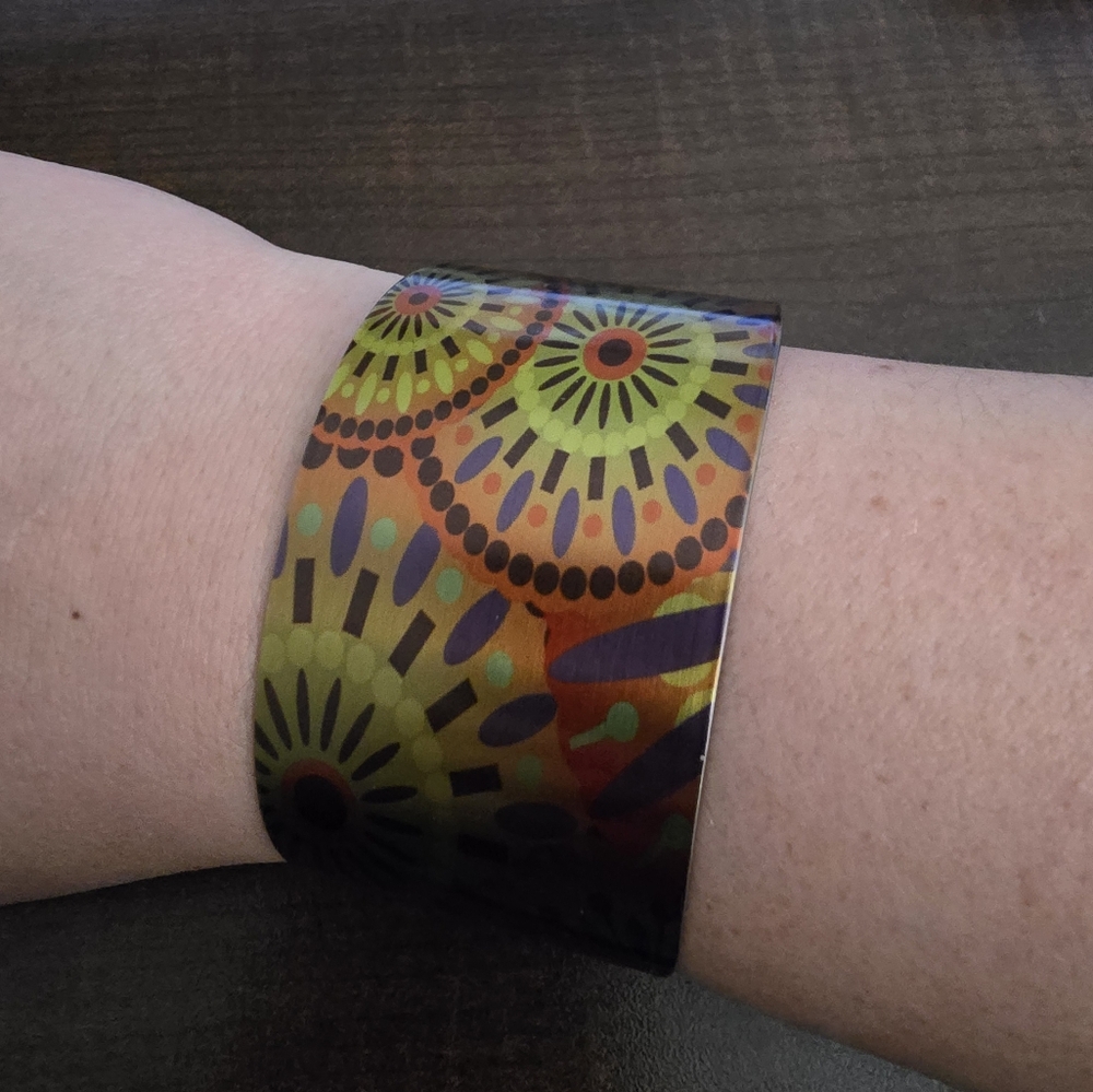 Tattooed Steel Sunbright Stainless Steel Green Orange And Purple Bracelet